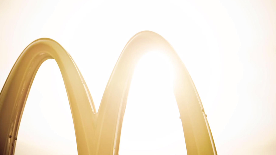 An image of the golden arches of a McDonald's sign.