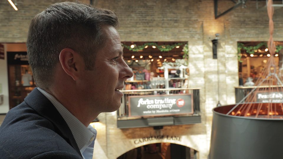 A profile image of Mayor of Winnipeg, Bryan Bowman, in the the Forks.