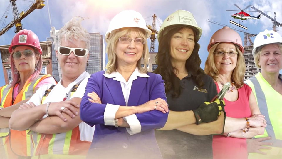 An image of a diverse group of worker woman in various working uniforms. There is a collage of buildings and construction equipment in the background.
